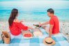 couple-honeymoon-have-picnic-beach_109800-17568.jpg